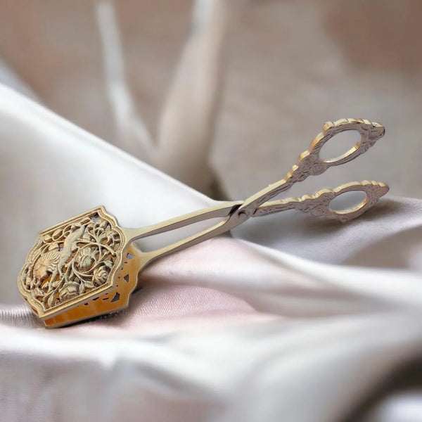 Qála Brass Tongs: Elevate Your Table, One Serve at a Time.