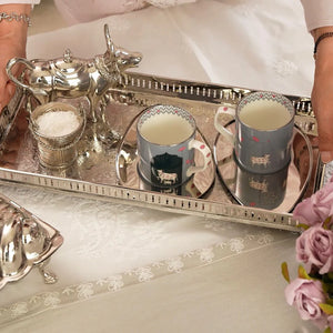 Nazm Baagh – A Garden of Verses in Brass